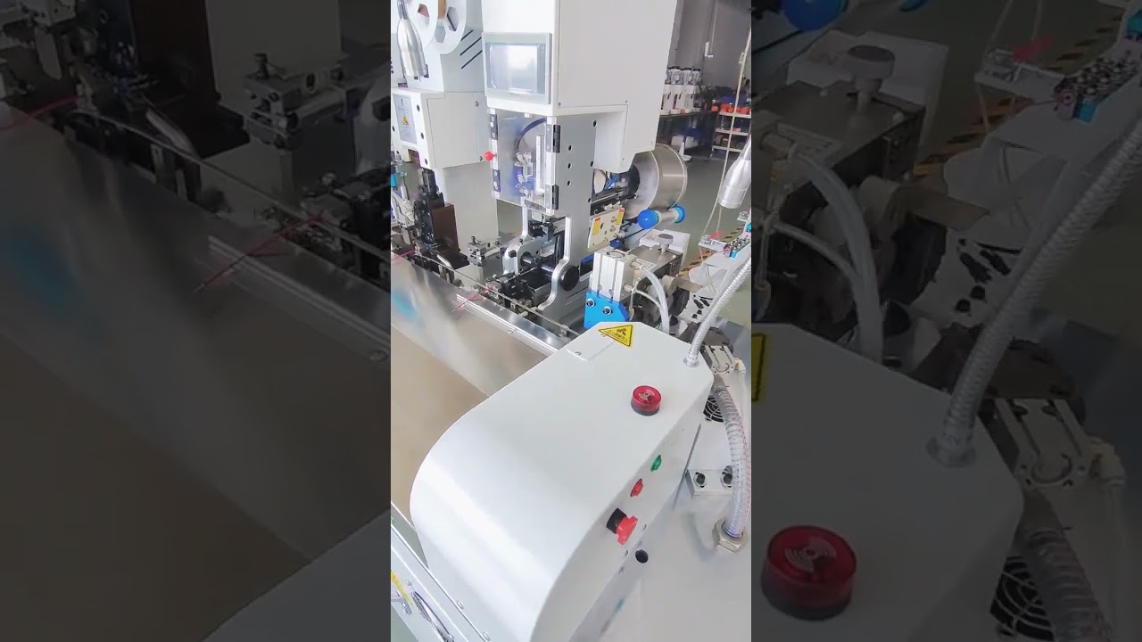 機関車用ワイヤーハーネス加工全自動機｜一端レインプラグ・一端ワイヤー終端処理